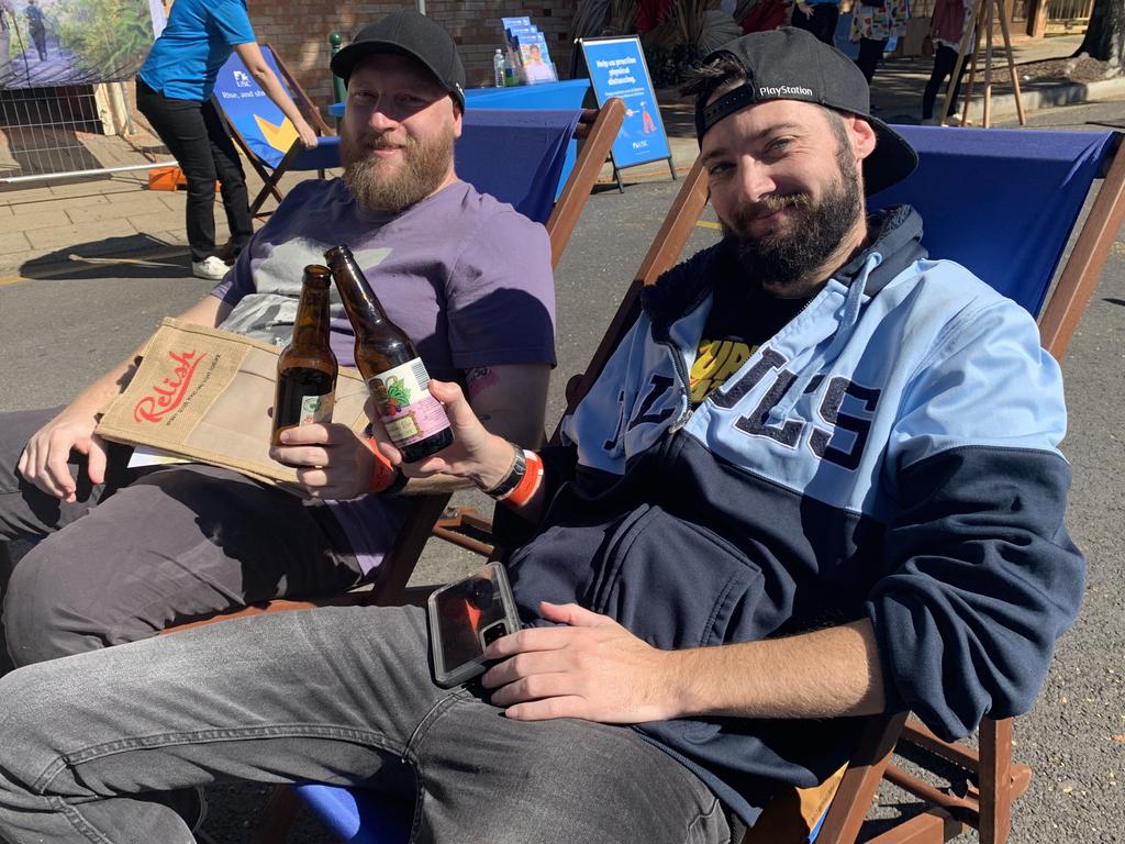 Tim Kerr and Ashley Coulstock from Maryborough enjoy drinks together at Relish Food and Wine Festival in Maryborough. Photo: Stuart Fast