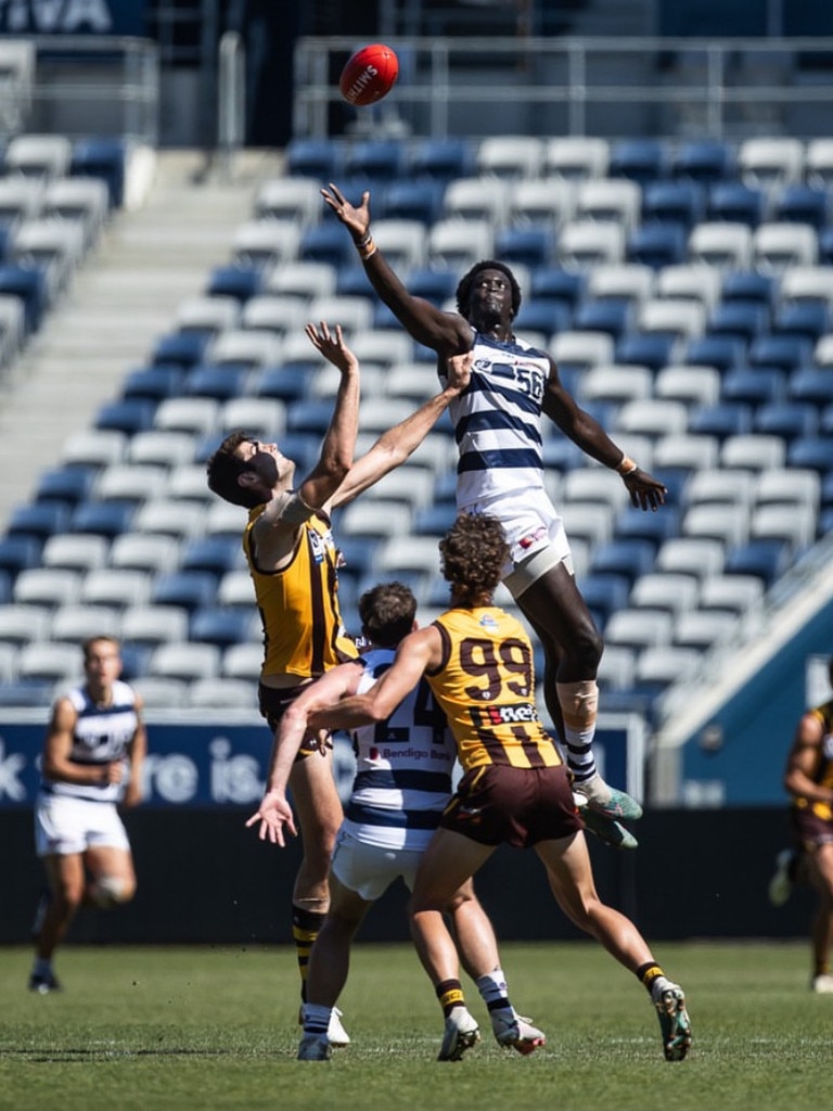 Ajang Kuol mun wins a tap at the centre bounce. Picture: Arj Giese