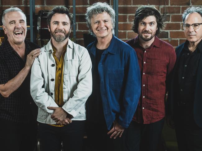 ***EXCLUSIVE FOR THE AUSTRALIAN*** Australian rock band Crowded House, whose seventh  album 'Dreamers Are Waiting' was released in 2021. L-R: Nick Seymour (bass), Liam Finn (guitar), Neil Finn (guitar/vocals), Elroy Finn (drums) and Mitchell Froom (keys). Picture: Stephen Dykes