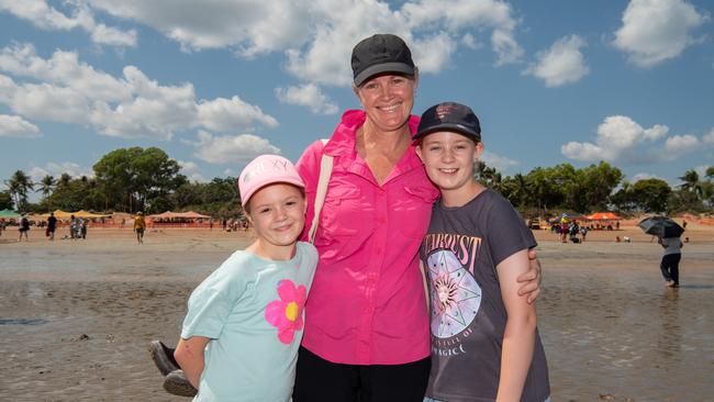 Zoey Humphreys, Amanda Humphreys and Kara Humphreys at the Darwin Beer Can Regatta at Mindil Beach, 2024. Picture: Pema Tamang Pakhrin