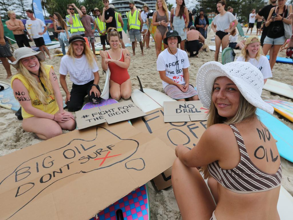 Protest at Burleigh against an oil company drilling in the Great Australian Bight. Elise Milner of Byron Bay (white Hat). Pic Mike Batterham.