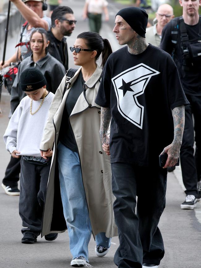 Kourtney Kardashian, Travis Barker, and her son Reign.