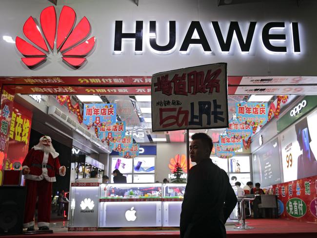 Huawei 5G internet services promoted at a mobile phones retail shop in Shenzhen in south China's Guangdong province. Picture: AP