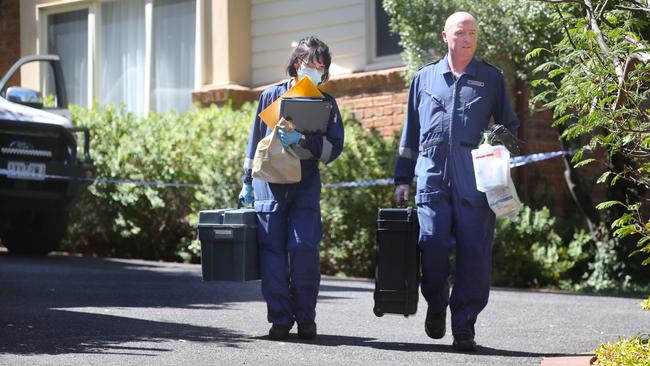 Police at the scene of a fatal stabbing in Lower Plenty. Picture: David Crosling