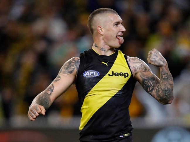 MELBOURNE, AUSTRALIA - SEPTEMBER 06: Dustin Martin of the Tigers celebrates on the final siren during the 2018 AFL First Qualifying Final match between the Richmond Tigers and the Hawthorn Hawks at the Melbourne Cricket Ground on September 06, 2018 in Melbourne, Australia. (Photo by Adam Trafford/AFL Media/Getty Images)