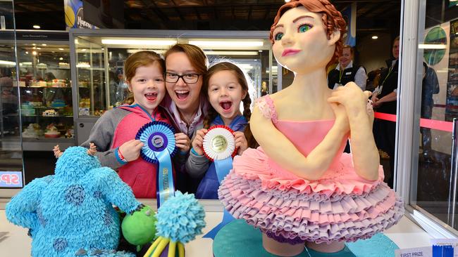 Dessert queen Jo Coleman and her two daughters Jennah, 7 and Alyssa, 6, have raked in the ribbons at the Royal Melbourne Show. Picture: Nicki Connolly