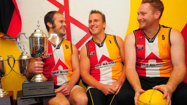 Bartel (middle) with Goodwood Saints premiership players Josh Starling and Eric Kells. Picture: Keryn Stevens