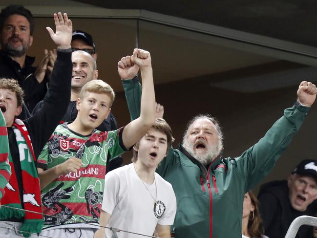 Russell Crowe celebrating a try by South Sydney as he watches the NRL game between the Rabbitohs and Roosters at Stadium Australia, Sydney Olympic Park. Picture: Jonathan Ng