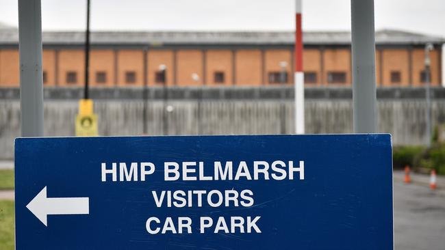 A sign directs people to the visitors car park at Belmarsh prison in south East London. Picture: Daniel Leal-Olivas/AFP