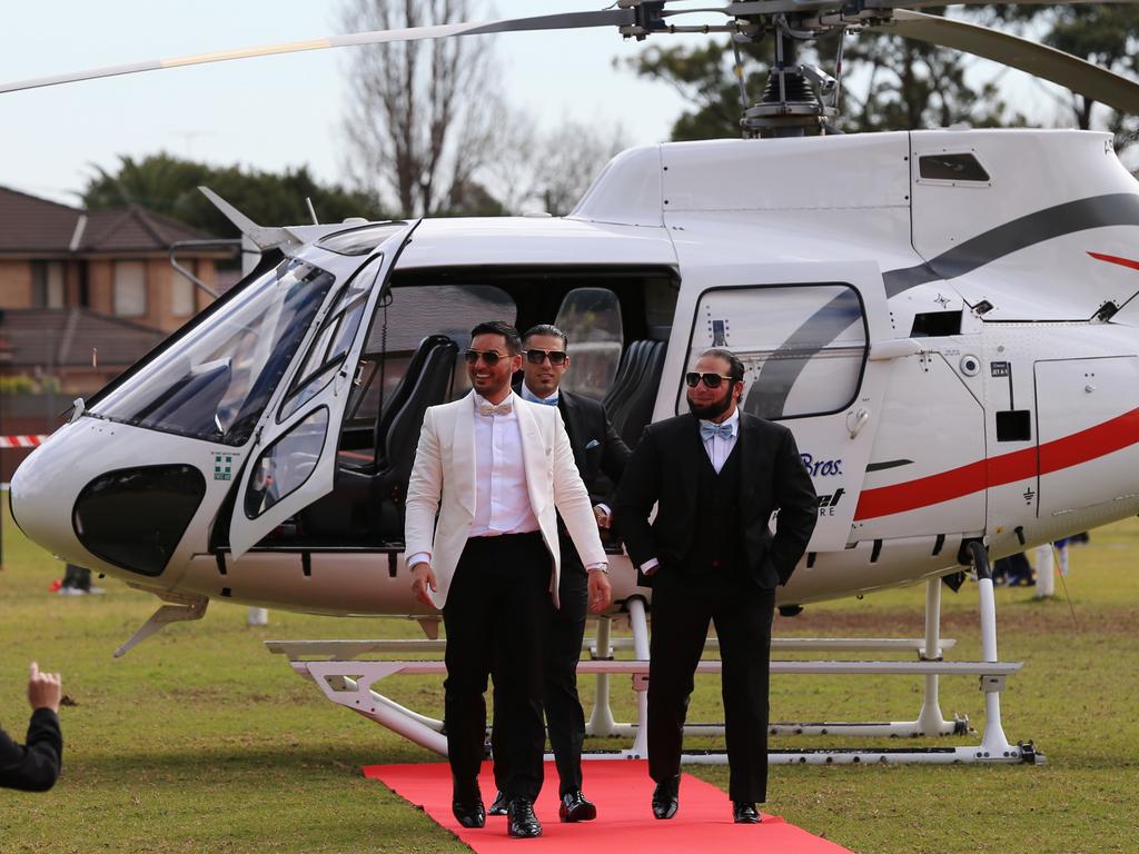 Auburn deputy mayor Salim Mehajer steps out of the helicopter right on the red carpet. Picture: Toby Zerna