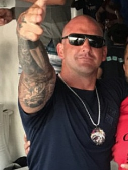 Mark Buddle, 37, Iran or Iraq. Self-proclaimed Comanchero boss and suspected major drug runner. Fled Australia in 2016 as a person of interest in fatal shooting of Chubb security guard Gary Allibon, $1 million reward.