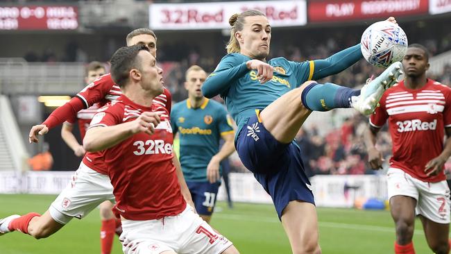 Hull City’s Jackson Irvine wins the ball ahead of Jonny Howson of Middlesbrough