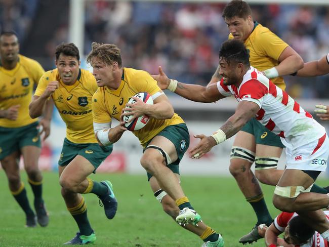 Michael Hooper charges upfield during the rugby union international between Japan and Wallabies on Saturday.