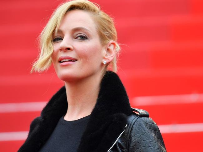 (FILES) In this file photo taken on May 18, 2017 US actress and President of the Un Certain Regard jury Uma Thurman arrives for the screening of the film 'Barbara' at the 70th edition of the Cannes Film Festival in Cannes, southern France.  Actress Uma Thurman, who is indelibly linked to Harvey Weinstein's Miramax studio thanks to her iconic roles in "Pulp Fiction" and "Kill Bill," has broken her silence about the disgraced Hollywood mogul, accusing him of attacking her and threatening her career. Dozens of Hollywood women -– including Ashley Judd, Gwyneth Paltrow, Kate Beckinsale and Salma Hayek -- have accused Weinstein of acts ranging from sexual assault to rape.Thurman, 47, told The New York Times in an interview published February 3, 2018 of two incidents in London that took place after the release of 1994's "Pulp Fiction."  / AFP PHOTO / LOIC VENANCE