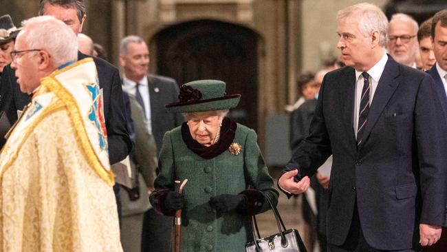 Queen Elizabeth and Prince Andrew arrive at Westminster Abbey for the service. Picture: AFP.