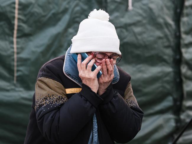 An evacuated Mariupol civilian talks on the phone at a relief centre for evacuees of the DPR Emergency Service in the village of Bezymennoye. Picture: Alexander Ryumin/TASS