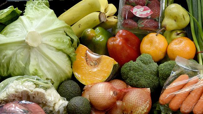 Cathy Harvey of Inglefarm with $30.00 worth of fresh produce. 05/07/2017. Cathy works at Fruitopia.  This amount of groceries compared to $30.00 with of McDonalds.