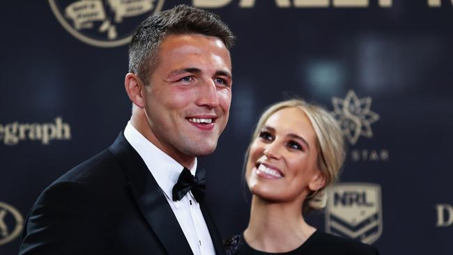 Happier times: Sam Burgess of the Rabbitohs and wife Phoebe Burgess arrive at the 2016 Dally M Awards. Picture: Ryan Pierse/Getty