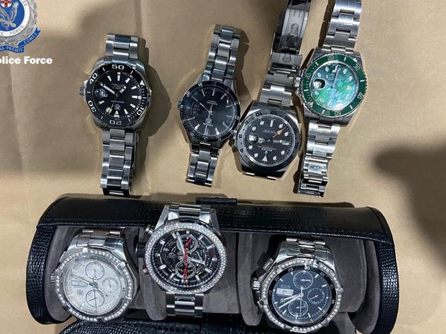 Police seized $40,000 in cash, designer watches, electronic devices, and prohibited drugs in raids across Sydney.