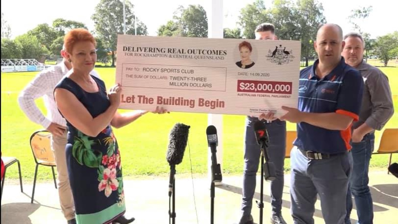 STADIUM FUNDING: One Nation leader Pauline Hanson handed over a giant novelty cheque for $23 million, courtesy of the Federal Government, for Rocky Sports Club's Gavin Shuker to get started on building Rocky Stadium.