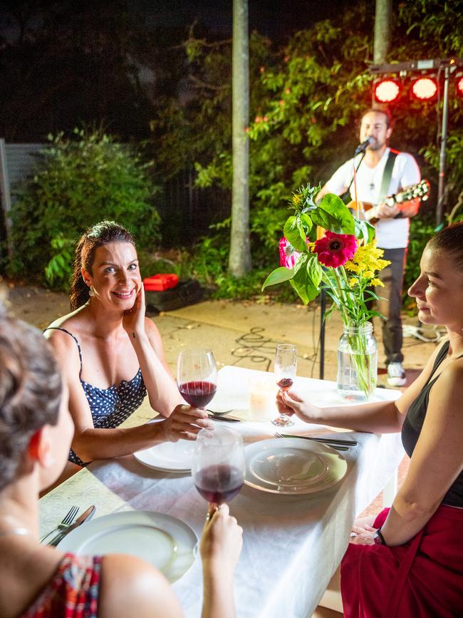 Scott Murphy performs for birthday girl Kristy Love and friends Sarah Makin and Christi Hamon. Picture: Che Chorley