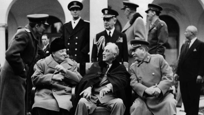 Winston Churchill, Franklin Roosevelt and Joseph Stalin in the grounds of the Livadia Palace, Yalta, during the Three Power Conference. Picture: Getty Images.