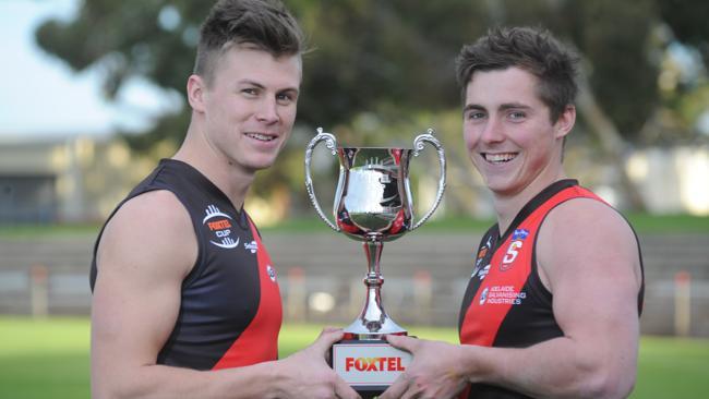 West Adelaide players Aaron Fielke and Aaron Anderson with the Foxtel Cup. 