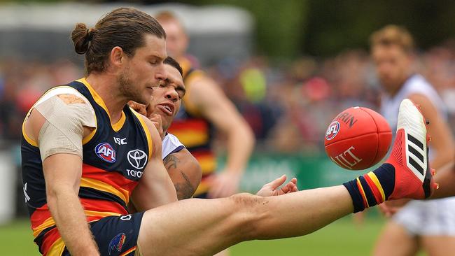 Bryce Gibbs gets one of his many possessions away against Fremantle in the JLT Community Series AFL match at Strathalbyn Oval on Sunday. Picture: Daniel Kalisz/Getty Images