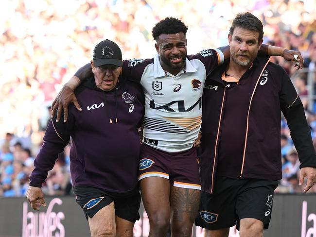 Ezra Mam was tackled off the ball and was assisted from the field with an ankle injury. Picture: Getty Images