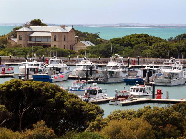 People and places in and around Robe, South Australia. Cray fishing boats in Robe Harbour.