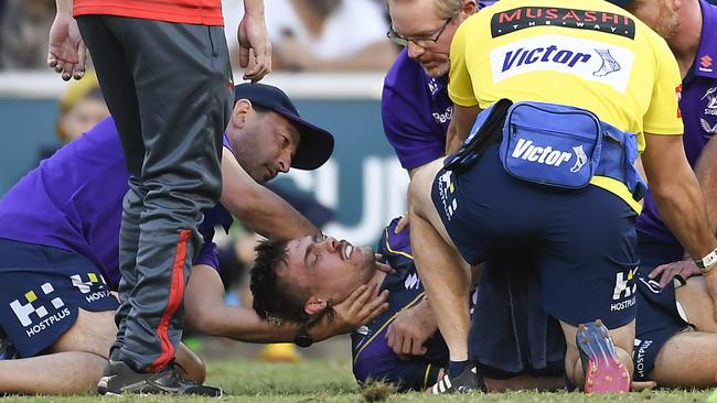 Ryan Papenhuyzen is taken from the field on a stretcher. Picture: Albert Perez/Getty