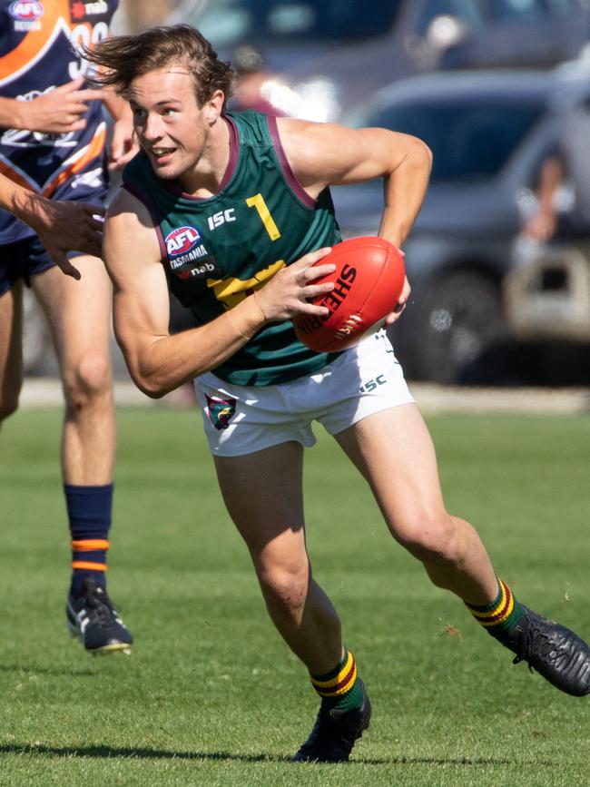 Mitch O'Neill breaks away from his opponent while playing for the Devils. Picture: GRANT WELLS