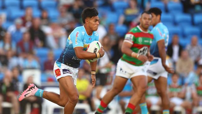 GOLD COAST, AUSTRALIA - JUNE 08: Keano Kini of the Titans runs the ball during the round 14 NRL match between Gold Coast Titans and South Sydney Rabbitohs at Cbus Super Stadium, on June 08, 2024, in Gold Coast, Australia. (Photo by Chris Hyde/Getty Images)