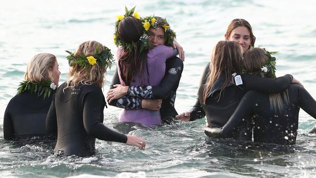 GOLD COAST, AUSTRALIA - JULY 11: Alex Pullin's girlfriend Ellidy Vlug and friends and family pay respects in memory of Alex 'Chumpy' Pullin on July 11, 2020 in Gold Coast, Australia. Australian Winter Olympic Games Snowboarder Alex 'Chumpy' Pullin died on Wednesday 8 July in a drowning accident while spearfishing at Palm Beach on the Gold Coast, aged 32. (Photo by Chris Hyde/Getty Images)