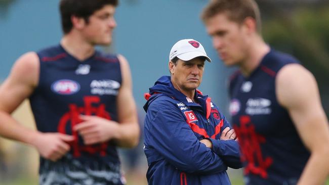 Paul Roos watches Angus Brayshaw and Tom McDonald.