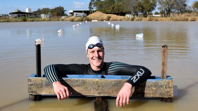 Australian Paralympic swimmer Colin Pearse has set up a lap lane in his parent's dam in northern Victoria to train while in COVID-19 lockdown. Picture: Steve Huntley.