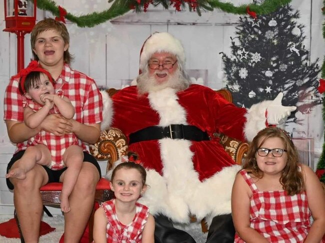 Eastwood-Young family with Santa (Dolph Lossberg): Phunky Photographics 2023 - Mackay. Sent in by Melissa Young.