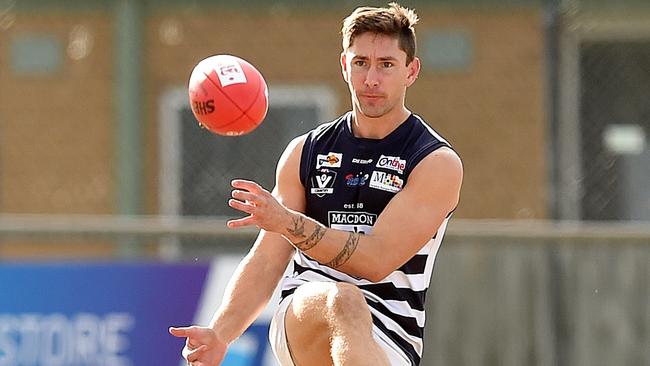 Shaun Harrison gets a kick for Macedon.