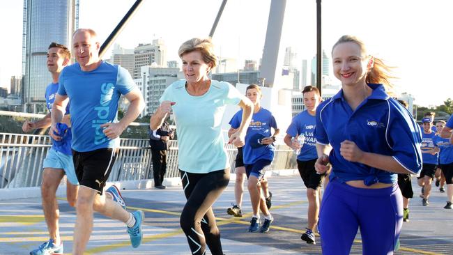 Julie Bishop joins other joggers on the Goodwill Bridge in Brisbane yesterday. Picture: Liam Kidston