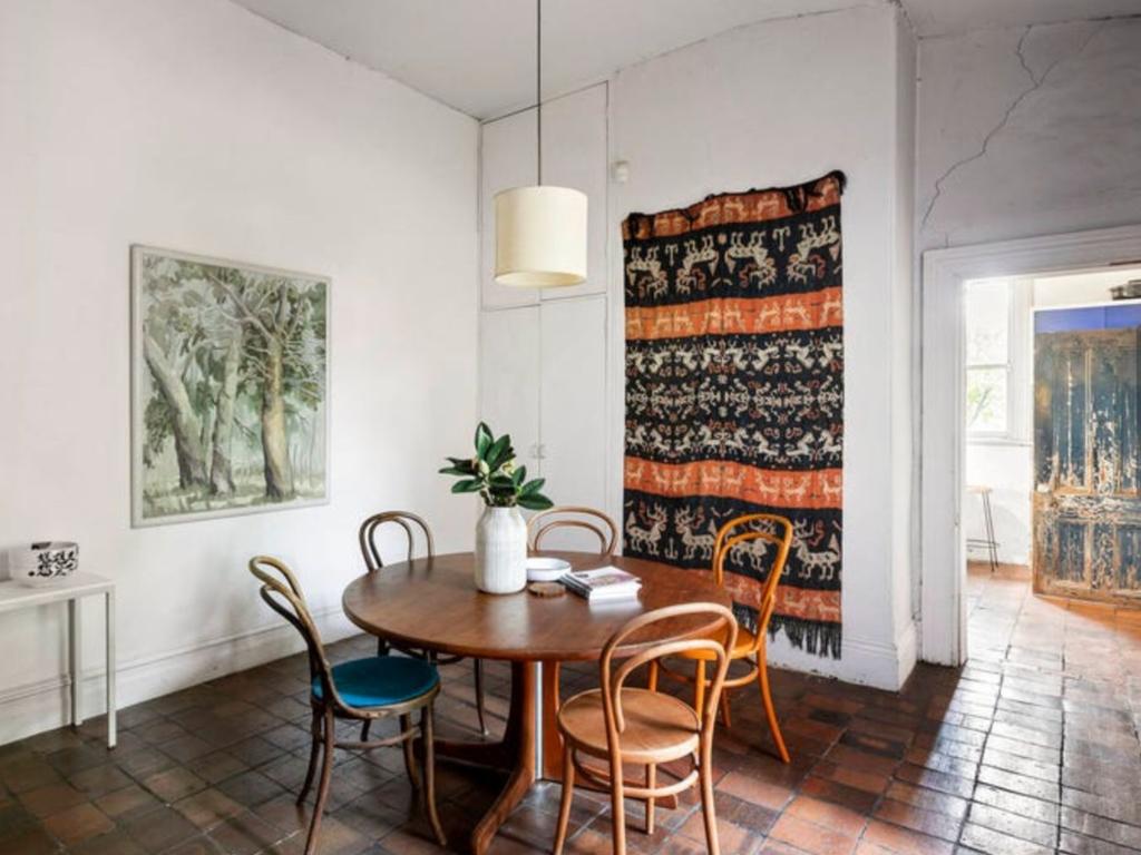 Cracks are evident on the wall above the door frame in this dining room. Picture: realestate.com.au