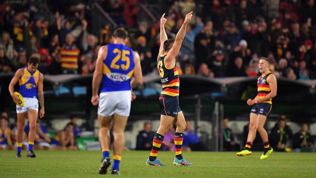 Taylor Walker celebrates after the final siren.