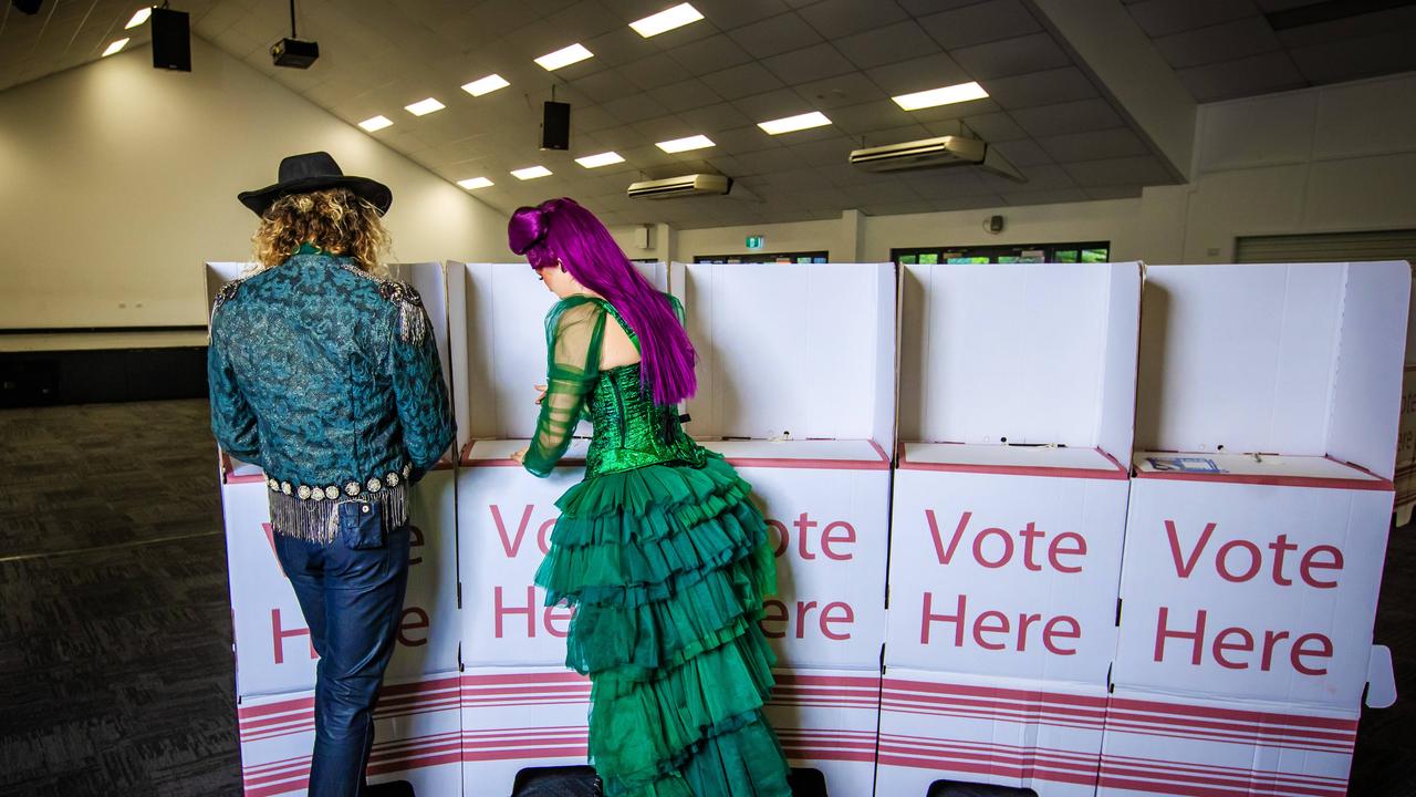 Dracula’s Gold Coast cast Tomi Gray and Amber Flaherty voting in the council election at Broadbeach State School ahead of their show call at 5pm. Picture: Nigel Hallett