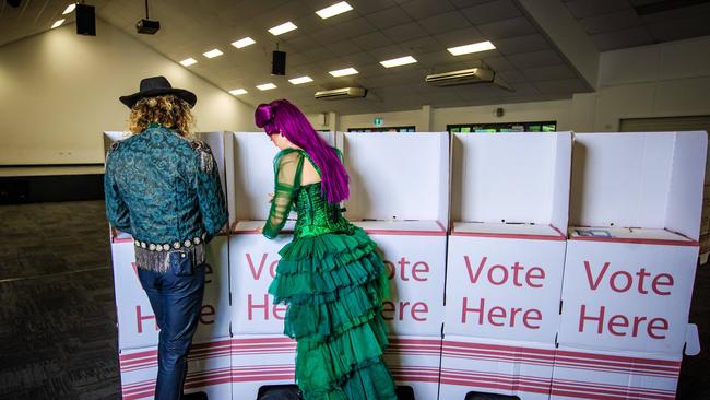 Dracula’s Gold Coast cast Tomi Gray and Amber Flaherty voting in the council election at Broadbeach State School ahead of their show call at 5pm. Picture: Nigel Hallett