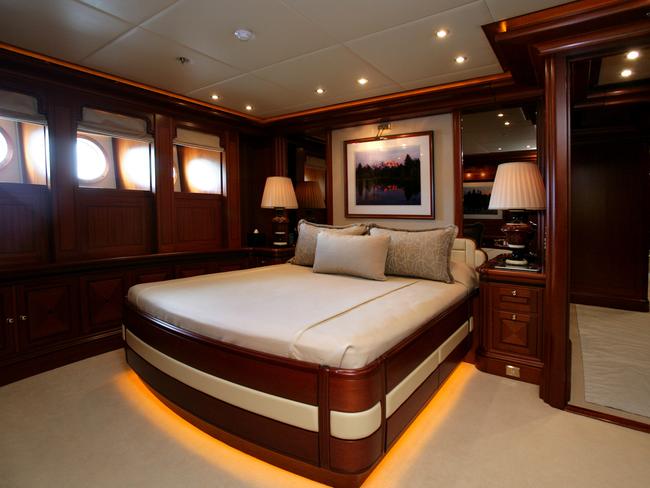 The yacht’s master bedroom also features a walk-in wardrobe and a spa. Picture: Supplied