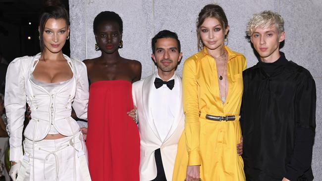 Bella Hadid, Adut Akech, Arsalaan Hyder, Gigi Hadid and Troye Sivan at the #BoF500 gala dinner during New York Fashion Week. Photo: Dimitrios Kambouris/Getty Images