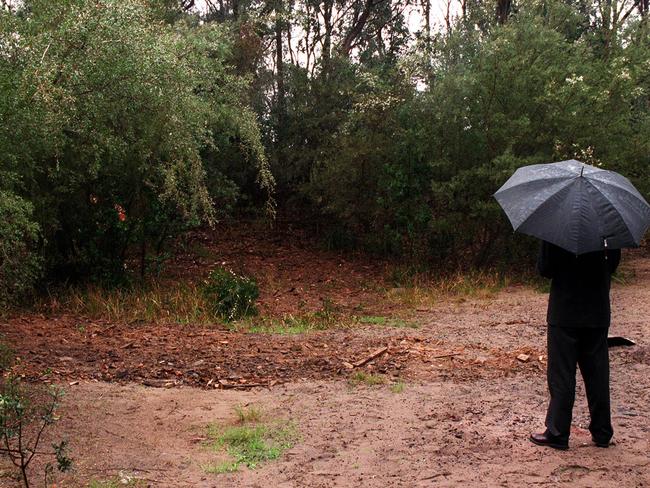 Police at the scene of the burial site after the body of murder victim Jodie Fesus was found at Seven Mile Beach National Park.