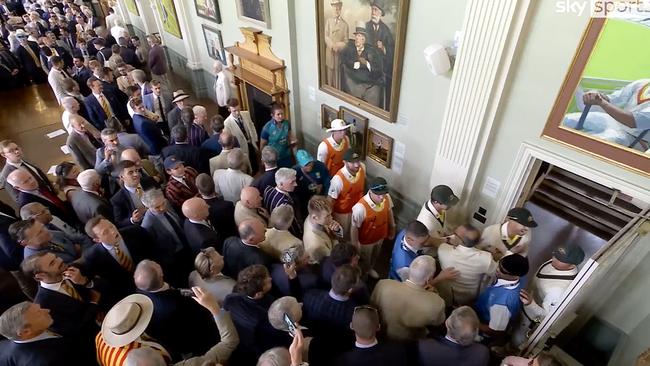 Australian players are confronted by MCC members in the Long Room at Lord’s in 2023.