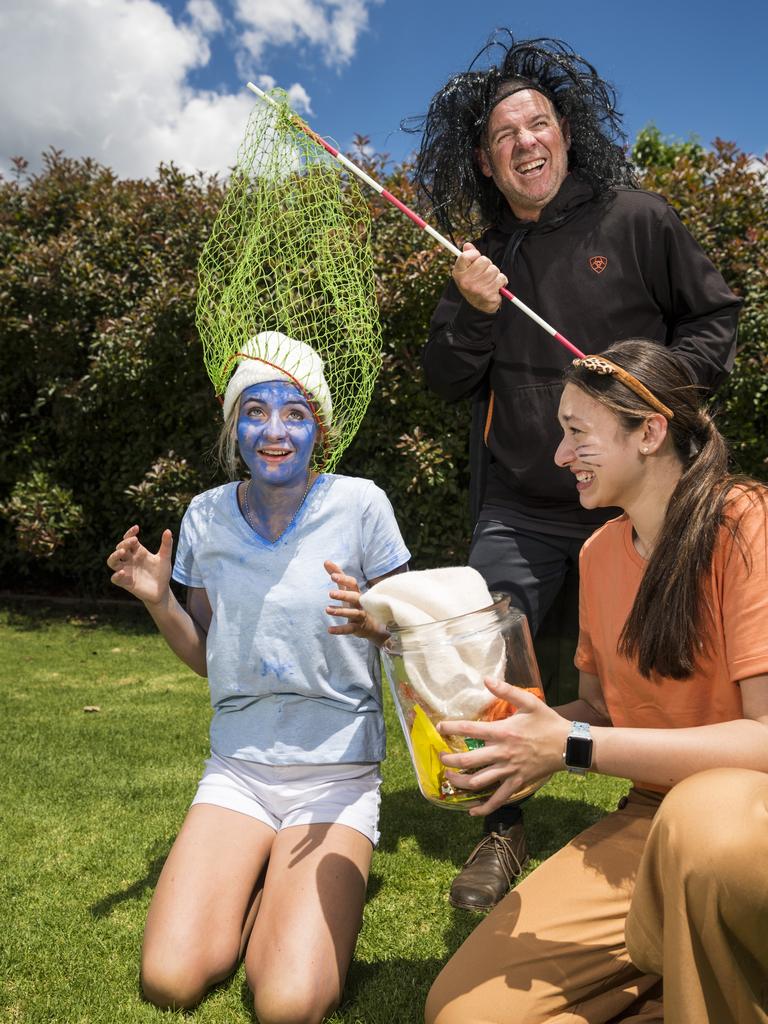 The CSW pastoral care group dressed up as characters from The Smurf's (from left) Jasmine Stewart, teacher Cameron Williams and Annie Seeto as St Ursula's College students dressed up for their boat race during St Ursula's Week, Wednesday, October 20, 2021. Picture: Kevin Farmer