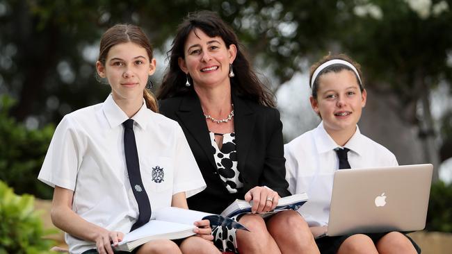 Principal Kate Hadwen of Perth’s PLC with Year 8 students Libby Rosenberg, left, and Olivia Ellis yesterday. Picture: Colin Murty