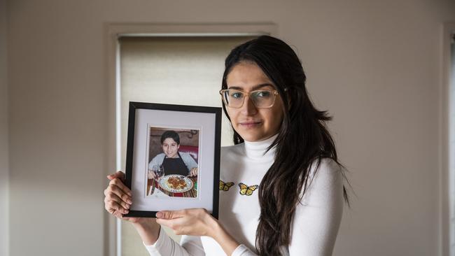 Jasmine Rolon with a picture of her brother, Jesse, who died suddenly on Anzac Day last year. Picture: Mark Cranitch.